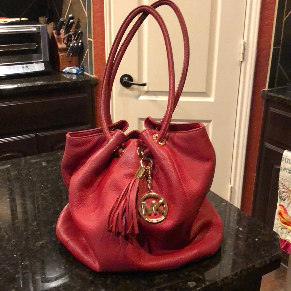 Michael Kors, is in good condition is original